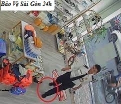 hinh anh khong khoi xuc dong cua bac bao ve khi vao cua hang giay